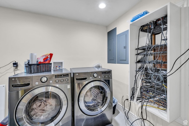 6067 S 3950 W, Roy, UT 84067 - laundry room featuring laundry area, electric panel, and washing machine and clothes dryer