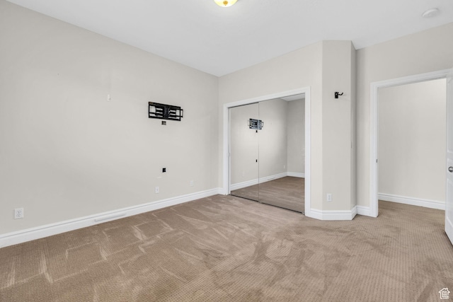 6067 S 3950 W, Roy, UT 84067 - unfurnished bedroom featuring carpet floors, a closet, and baseboards
