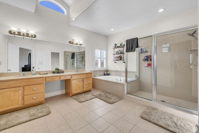 6067 S 3950 W, Roy, UT 84067 - full bathroom with a sink, a bath, tile patterned floors, double vanity, and a stall shower