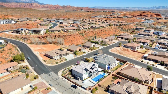 bird's eye view with a residential view and a mountain view