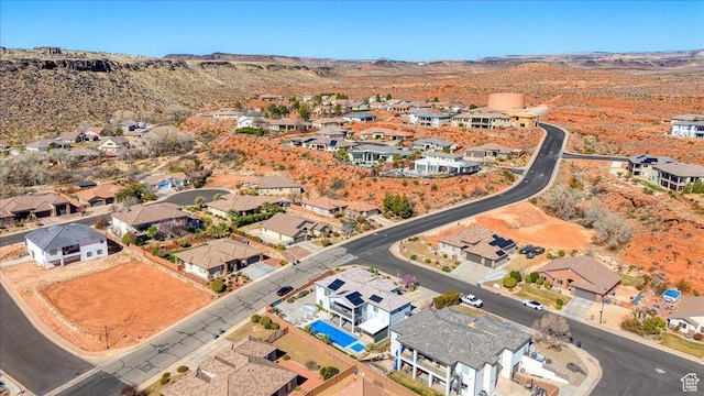 aerial view featuring a mountain view and a residential view