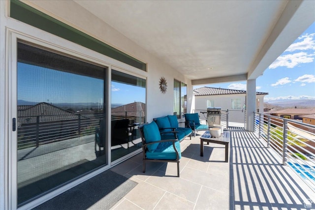 balcony featuring a sunroom