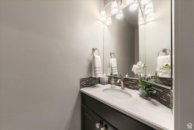 bathroom with backsplash and vanity
