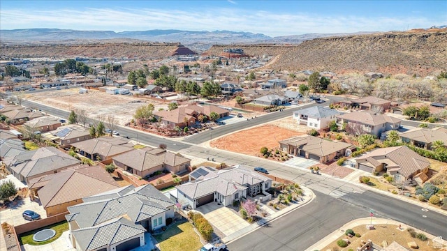 aerial view featuring a mountain view and a residential view