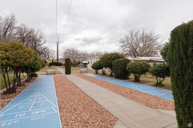1160 E Telegraph St Unit 220, Washington, UT 84780 - view of property's community with shuffleboard and a residential view