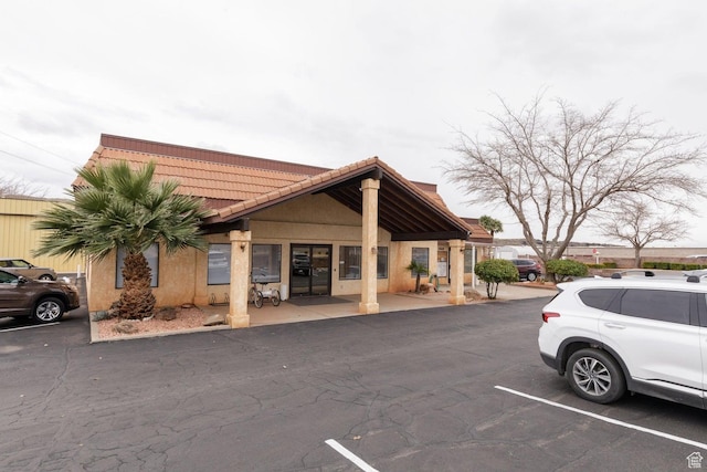 1160 E Telegraph St Unit 220, Washington, UT 84780 - view of building exterior with uncovered parking