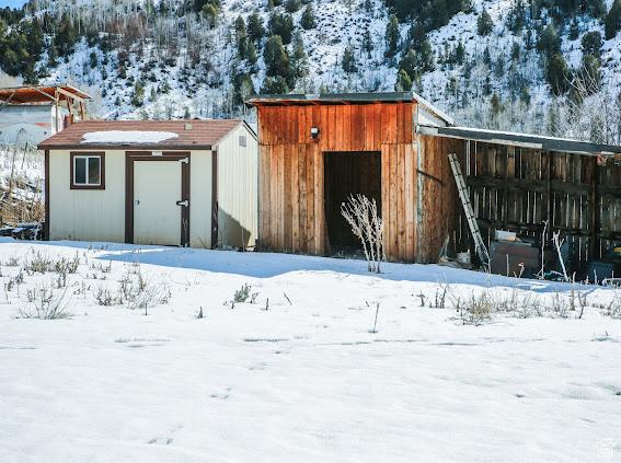 1290 Echo Crk Unit 2, Echo, UT 84024 - snow covered structure with an outbuilding
