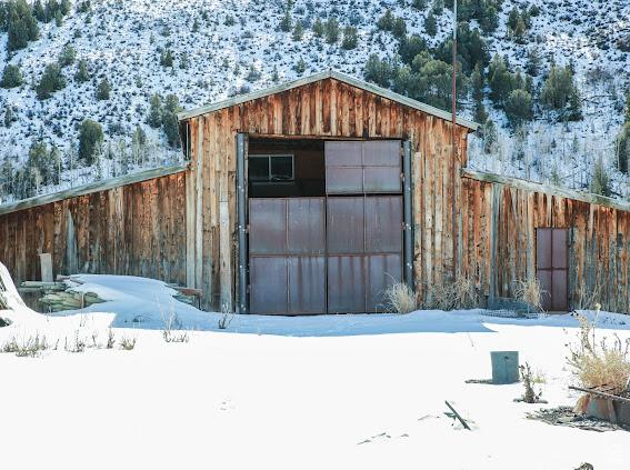 1290 Echo Crk Unit 2, Echo, UT 84024 - snow covered structure featuring an outdoor structure and fence