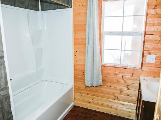 1290 Echo Crk Unit 2, Echo, UT 84024 - full bathroom featuring wood finished floors, vanity, and wooden walls