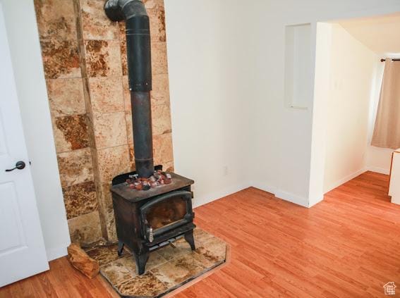 1290 Echo Crk Unit 2, Echo, UT 84024 - room details with wood finished floors and a wood stove