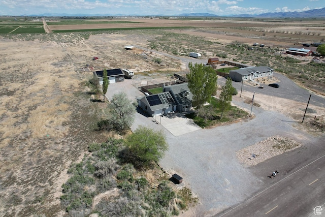 bird's eye view with a mountain view and a rural view