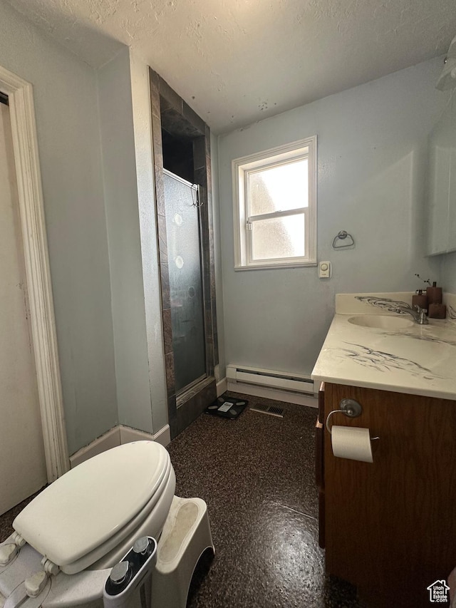 full bathroom with vanity, toilet, a textured ceiling, a shower stall, and a baseboard heating unit