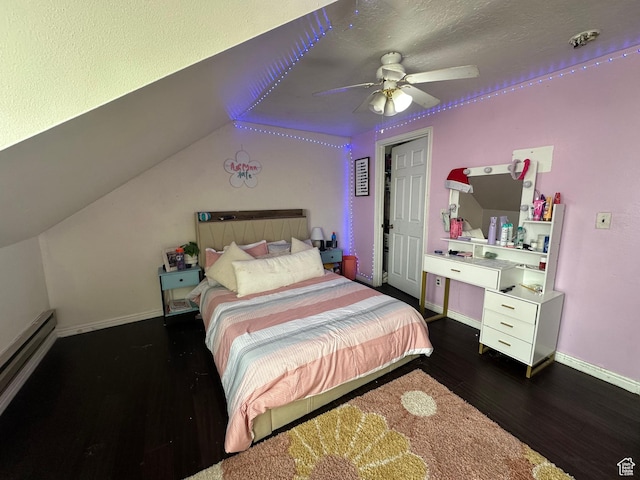 bedroom with ceiling fan, baseboard heating, baseboards, wood finished floors, and vaulted ceiling