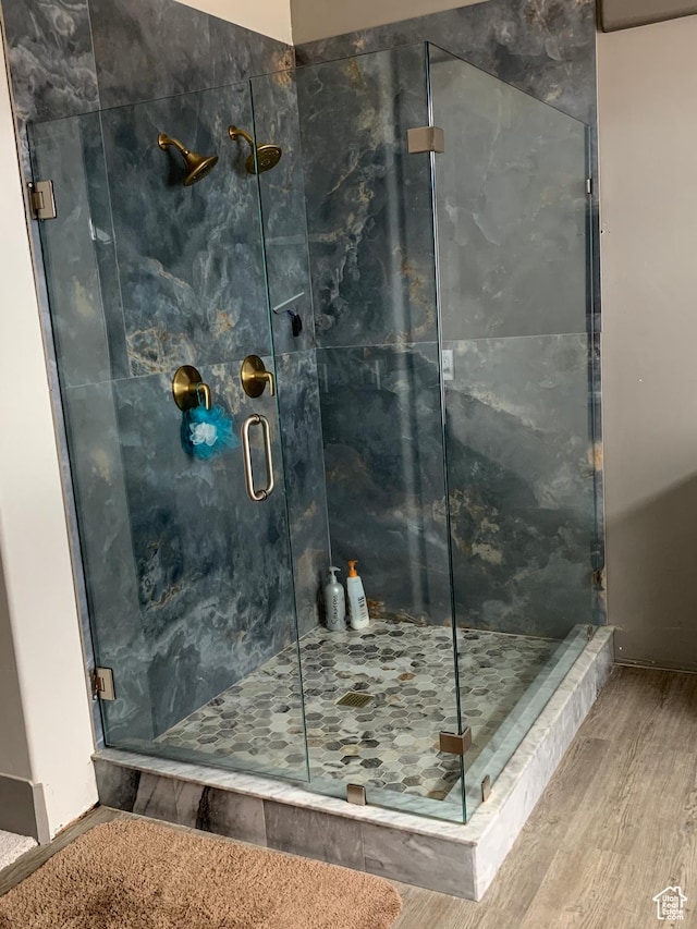 3606 E 375 S, Roosevelt, UT 84066 - bathroom with a marble finish shower and wood finished floors