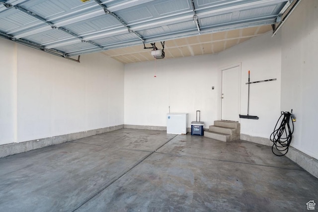 4758 E Hidden Loop Rd, Eagle Mountain, UT 84005 - garage featuring a garage door opener