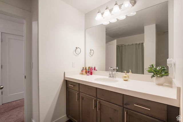 4758 E Hidden Loop Rd, Eagle Mountain, UT 84005 - bathroom featuring baseboards and vanity