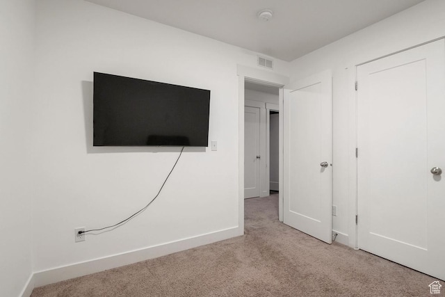 4758 E Hidden Loop Rd, Eagle Mountain, UT 84005 - unfurnished bedroom featuring carpet flooring, visible vents, and baseboards