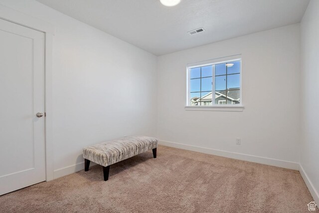 4758 E Hidden Loop Rd, Eagle Mountain, UT 84005 - living area featuring carpet floors, baseboards, and visible vents