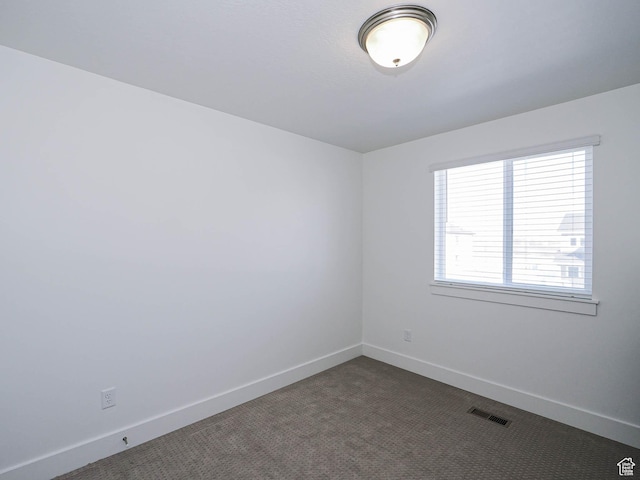 3361 W 3275 N, Plain City, UT 84404 - empty room with dark colored carpet, visible vents, and baseboards