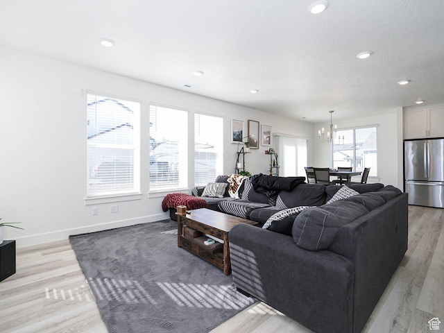 3361 W 3275 N, Plain City, UT 84404 - living room featuring recessed lighting, light wood-style flooring, and baseboards