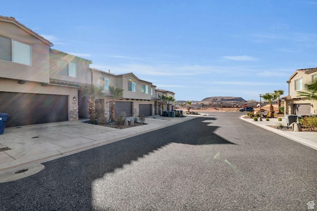 506 N Sol Grande Ln, Washington, UT 84780 - view of road featuring a residential view and a mountain view