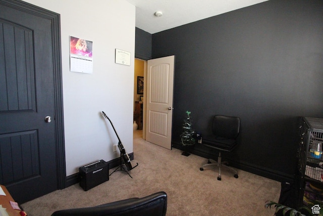 office area featuring carpet floors and baseboards