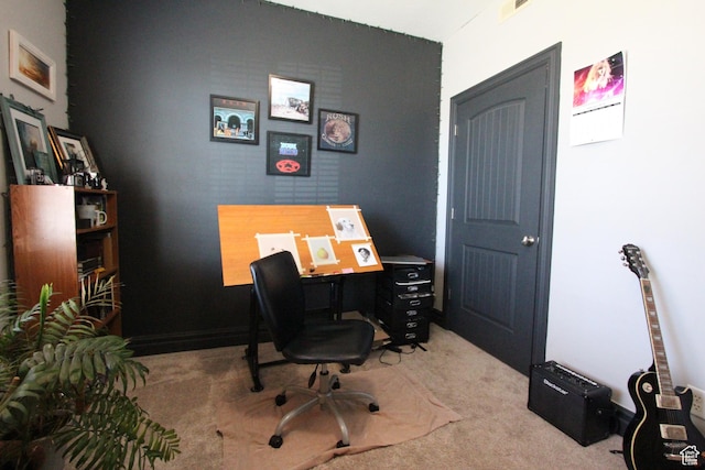 carpeted home office featuring visible vents
