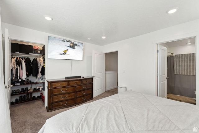 1099 E Quarterdeck Way, Saratoga Springs, UT 84045 - bedroom with a walk in closet, recessed lighting, a closet, and carpet