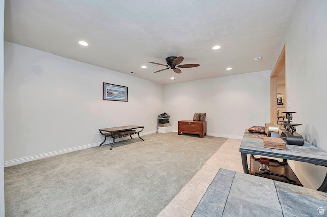living area featuring carpet flooring, recessed lighting, ceiling fan, and baseboards