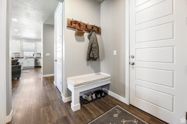 1879 N 925 E, North Ogden, UT 84414 - mudroom with dark wood finished floors, baseboards, a textured ceiling, and recessed lighting