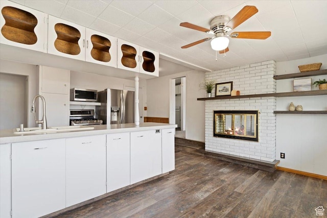 405 W 5100 S, Washington Terrace, UT 84405 - kitchen with stainless steel appliances, dark wood-style floors, a ceiling fan, and light countertops