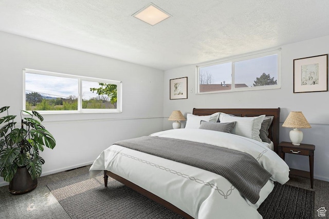 405 W 5100 S, Washington Terrace, UT 84405 - bedroom featuring baseboards and a textured ceiling