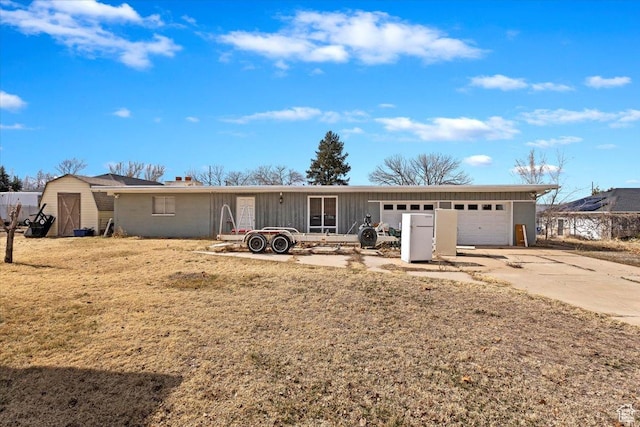 445 W 5100 S, Washington Terrace, UT 84405 - single story home featuring an outdoor structure, a garage, and driveway