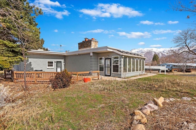 445 W 5100 S, Washington Terrace, UT 84405 - rear view of house featuring a deck with mountain view and a chimney