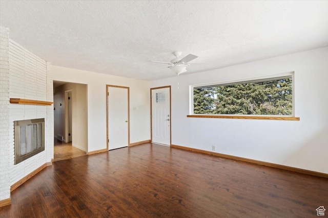 445 W 5100 S, Washington Terrace, UT 84405 - unfurnished living room with baseboards, wood-type flooring, a textured ceiling, and ceiling fan