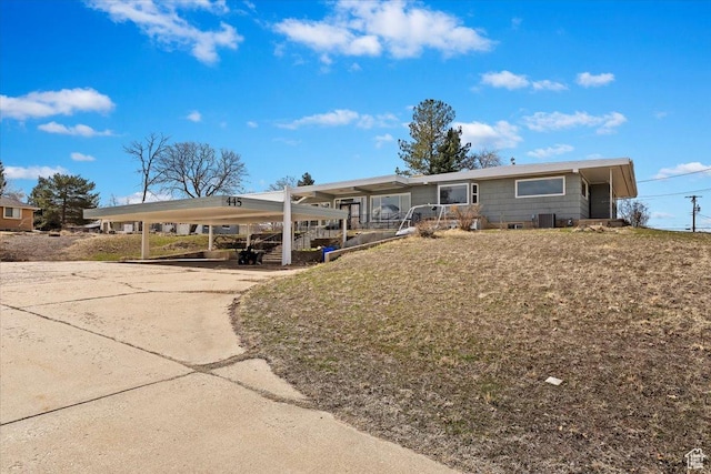 445 W 5100 S, Washington Terrace, UT 84405 - single story home featuring a carport and concrete driveway