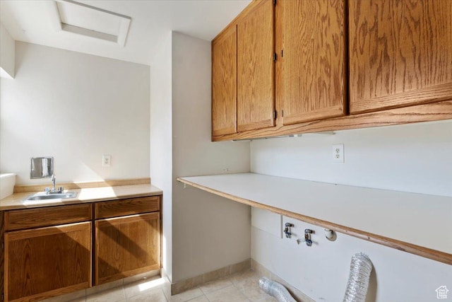 445 W 5100 S, Washington Terrace, UT 84405 - laundry room featuring a sink, cabinet space, light tile patterned floors, baseboards, and hookup for a washing machine