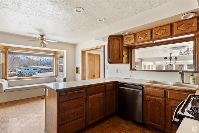 445 W 5100 S, Washington Terrace, UT 84405 - kitchen featuring range with electric stovetop, ceiling fan, a sink, a textured ceiling, and stainless steel dishwasher