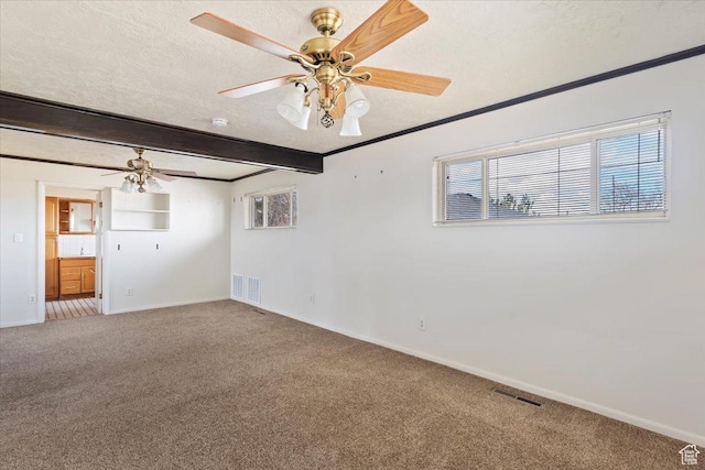 445 W 5100 S, Washington Terrace, UT 84405 - spare room featuring visible vents, carpet floors, a textured ceiling, crown molding, and beamed ceiling