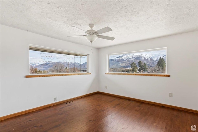 445 W 5100 S, Washington Terrace, UT 84405 - empty room featuring visible vents, baseboards, and hardwood / wood-style floors