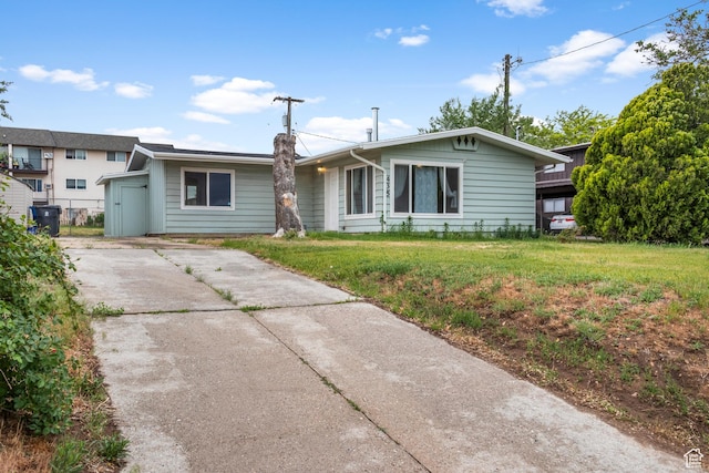 435 W 4800 S, Washington Terrace, UT 84405 - ranch-style home featuring driveway and a front lawn