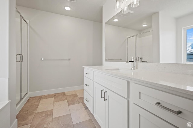 635 S 85 E Unit 26, Smithfield, UT 84335 - full bath featuring recessed lighting, baseboards, vanity, and a shower stall