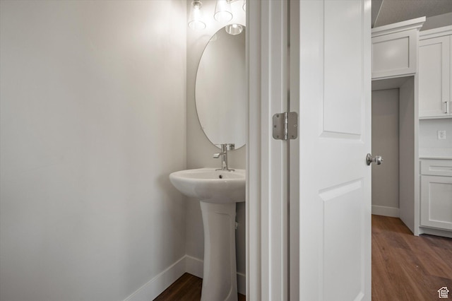 635 S 85 E Unit 26, Smithfield, UT 84335 - bathroom with wood finished floors and baseboards
