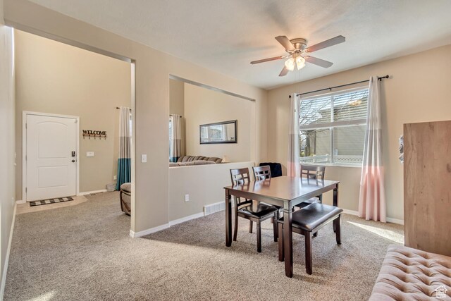 1114 Alexander Ct, Grantsville, UT 84029 - dining area featuring a ceiling fan, visible vents, baseboards, and carpet flooring
