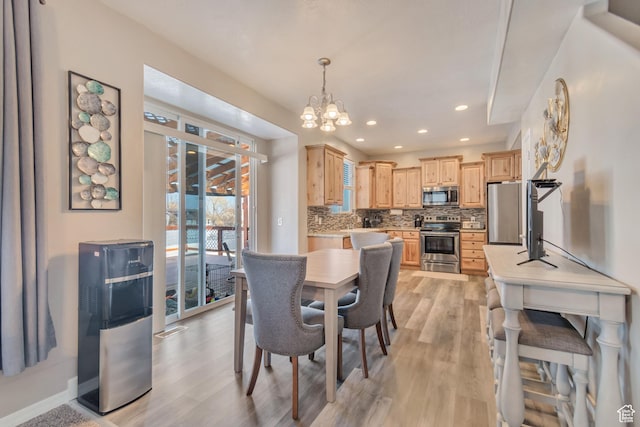 1114 Alexander Ct, Grantsville, UT 84029 - dining room featuring baseboards, light wood finished floors, recessed lighting, and a notable chandelier