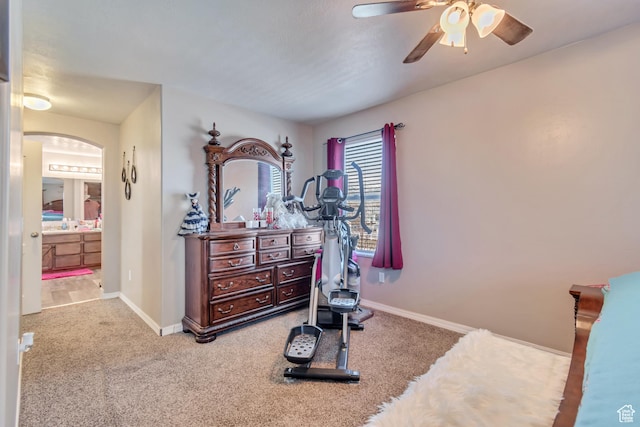 1114 Alexander Ct, Grantsville, UT 84029 - workout area featuring arched walkways, ceiling fan, carpet flooring, and baseboards