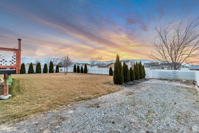 1114 Alexander Ct, Grantsville, UT 84029 - yard at dusk with fence