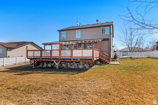 1114 Alexander Ct, Grantsville, UT 84029 - back of property featuring a fenced backyard, a lawn, a pergola, and a wooden deck