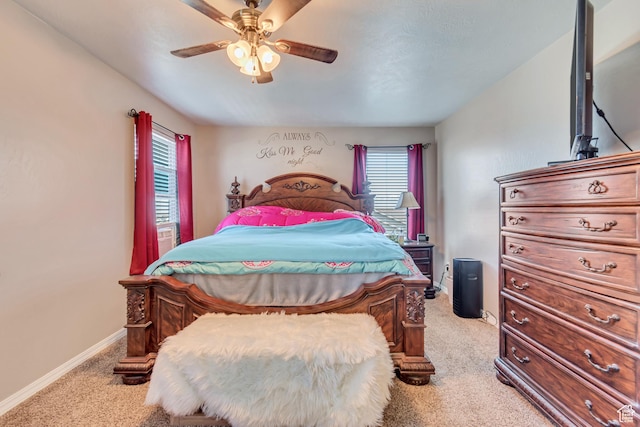 1114 Alexander Ct, Grantsville, UT 84029 - bedroom with baseboards, a ceiling fan, and light colored carpet