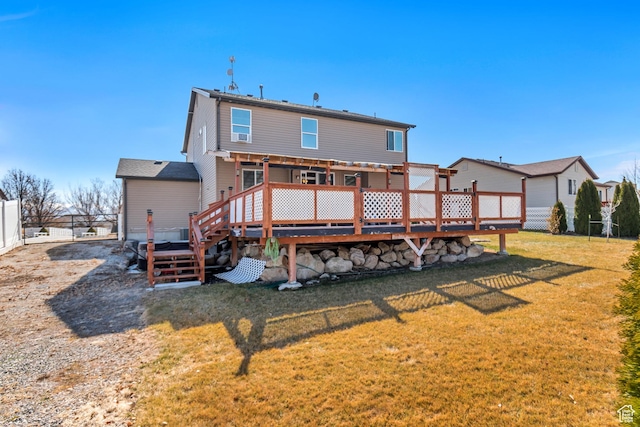 1114 Alexander Ct, Grantsville, UT 84029 - rear view of house with a yard, fence, and a deck